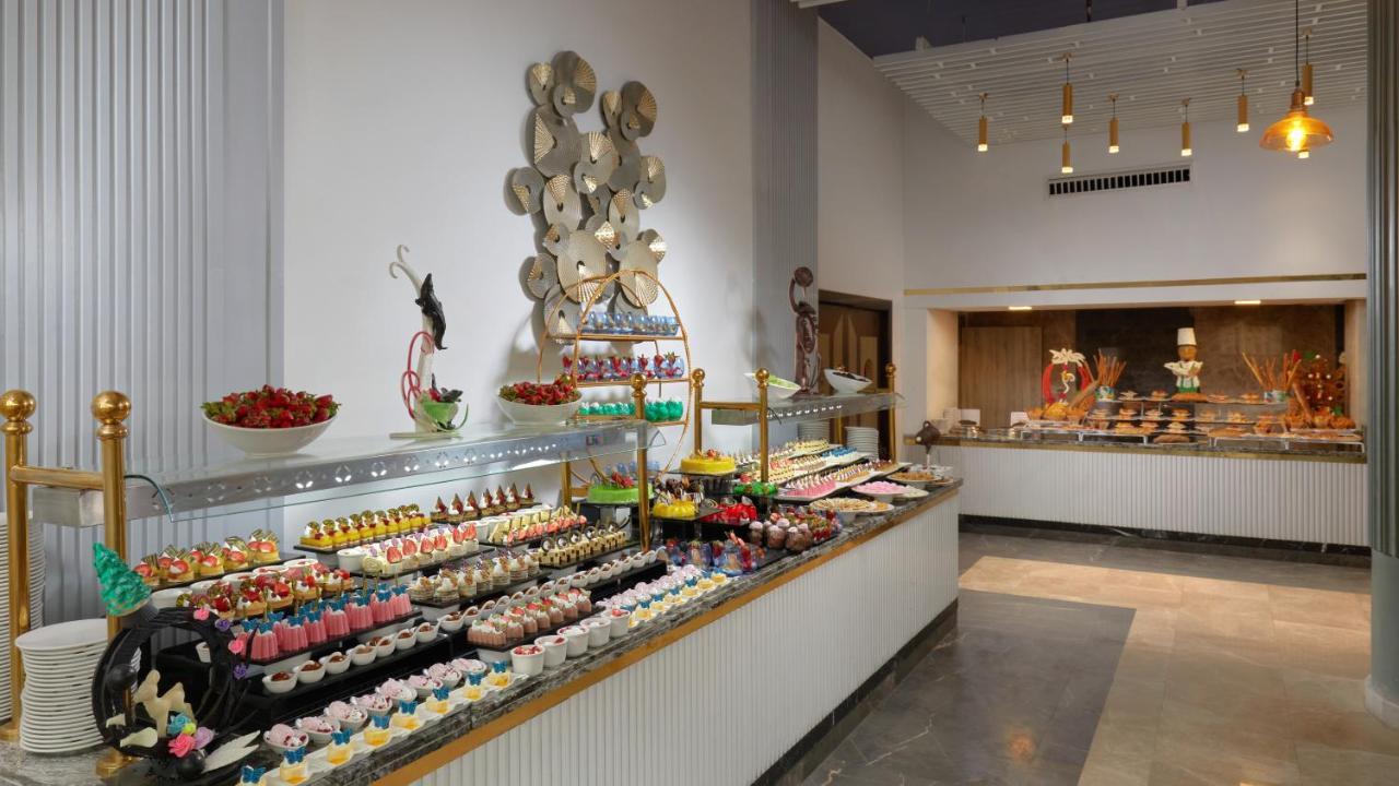 Bellagio Beach Resort & Spa Hurghada Exterior photo The dessert counter at the buffet